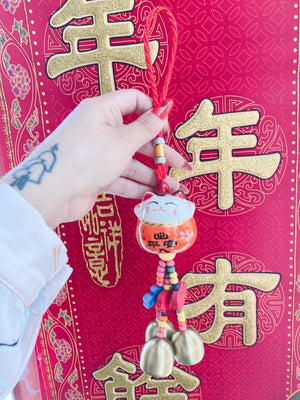 Colgante amuleto de maneki neko