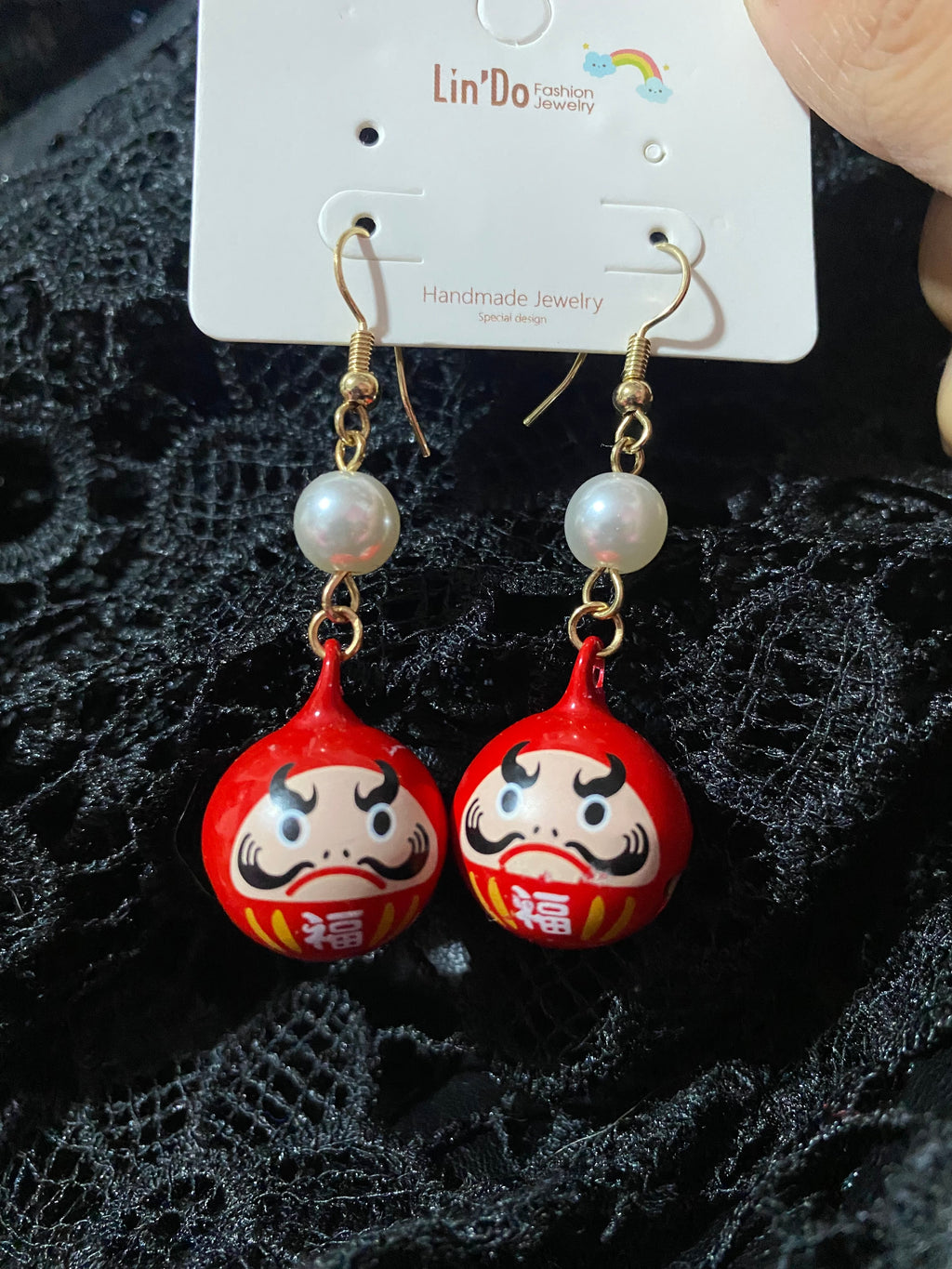 Aretes daruma