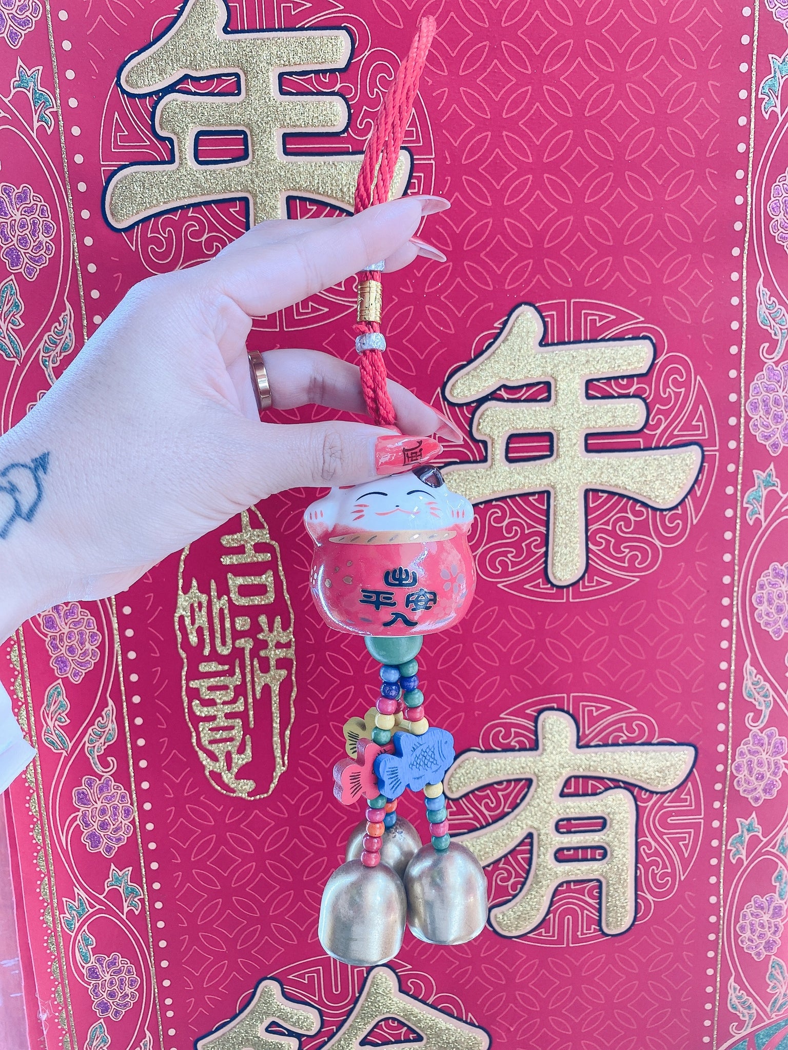 Colgante amuleto de maneki neko